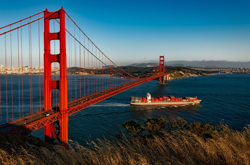 Container ship passes under Golden Gate Bridge